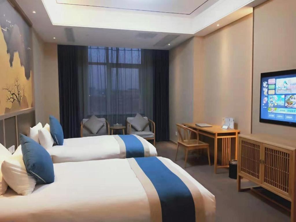 Feicheng Blossom Hotel Экстерьер фото